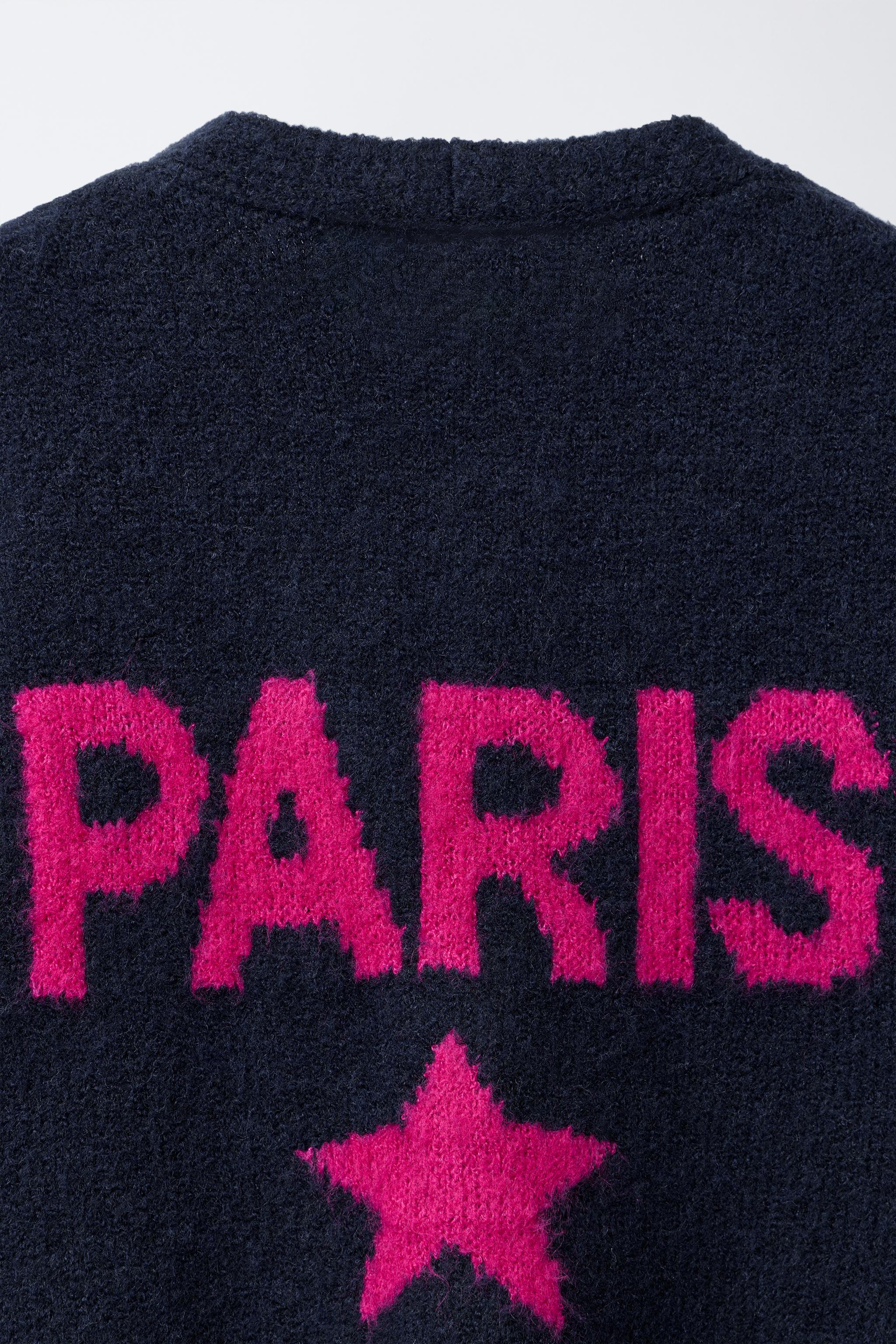 GILET EN MAILLE AVEC INSCRIPTION CONTRASTE